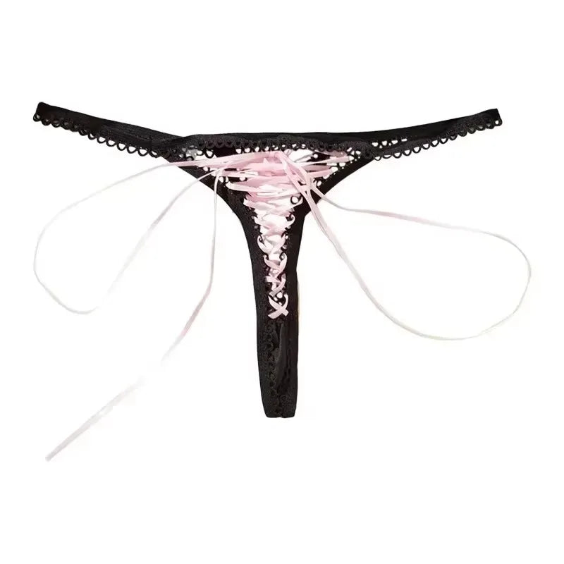 Pink lace thong panties with contrasting black details, designed for confident DDLG ABDL fashion lovers