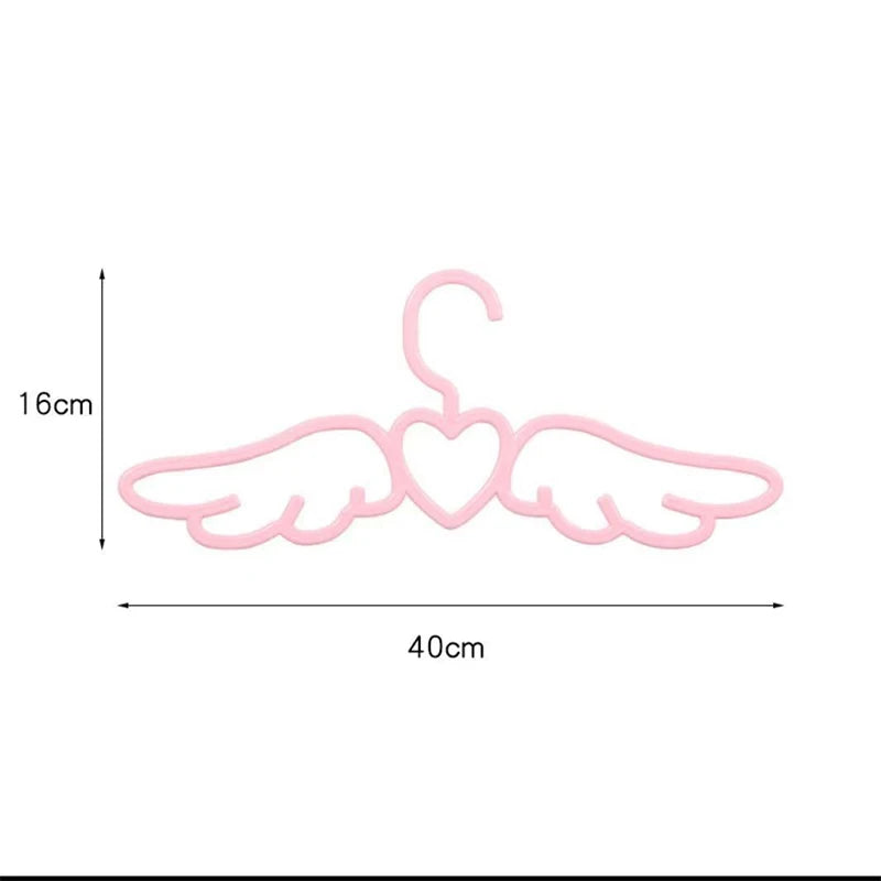 Whimsical closet hanger with wings and heart details perfect for ABDL DDLG kawaii wardrobe