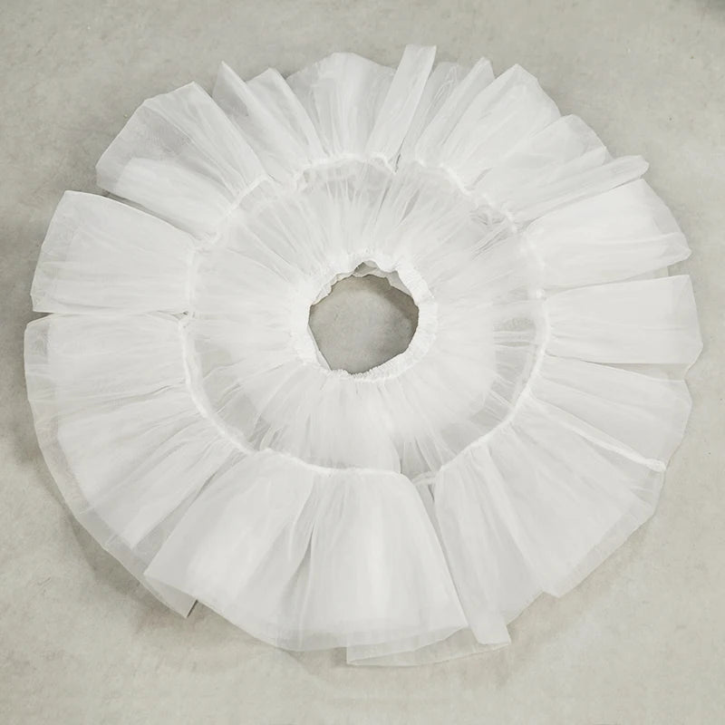 Top down view of white petticoat with elastic waist for easy and flexible fit