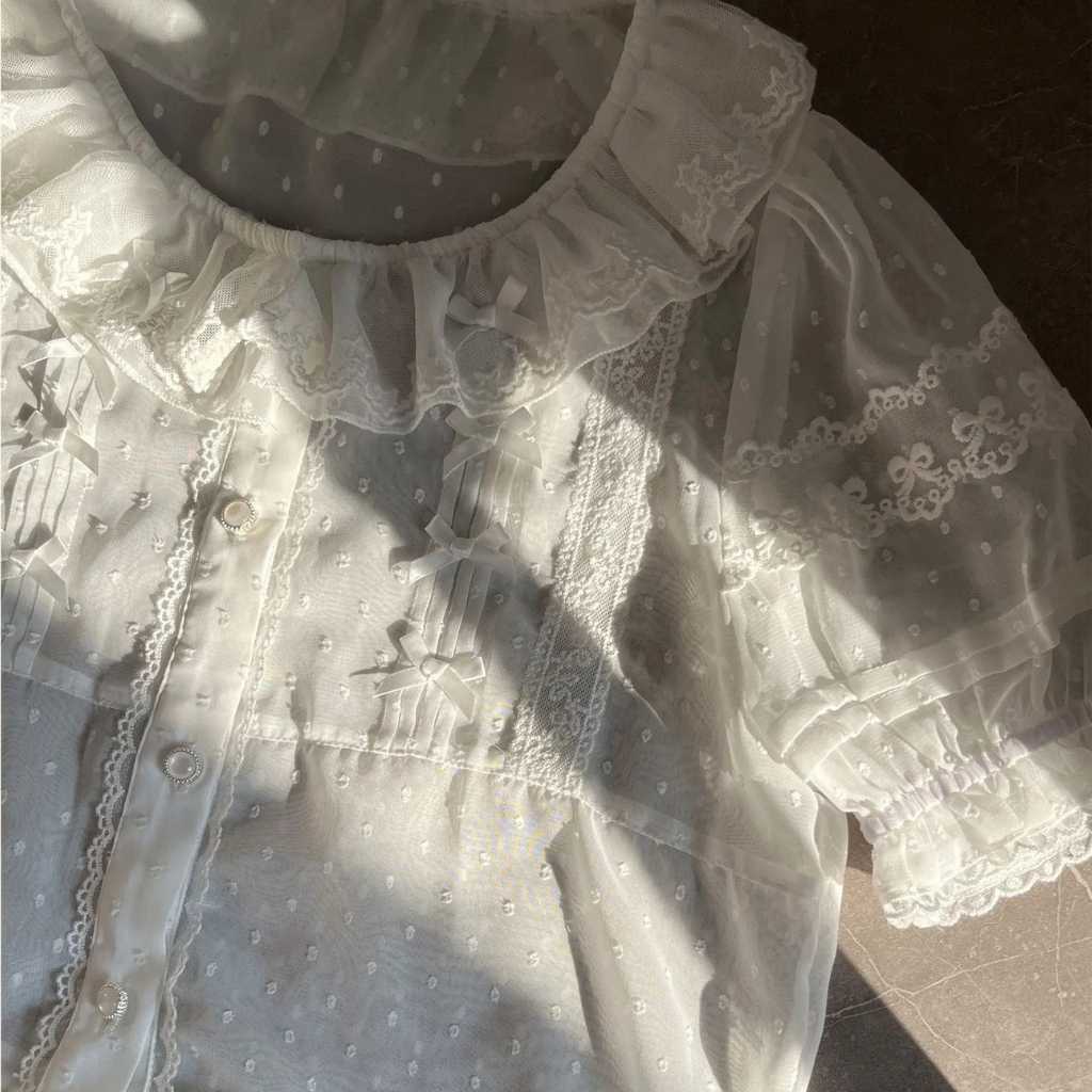 White puff sleeve lolita blouse with ruffles, perfect for fairycore and soft girl looks