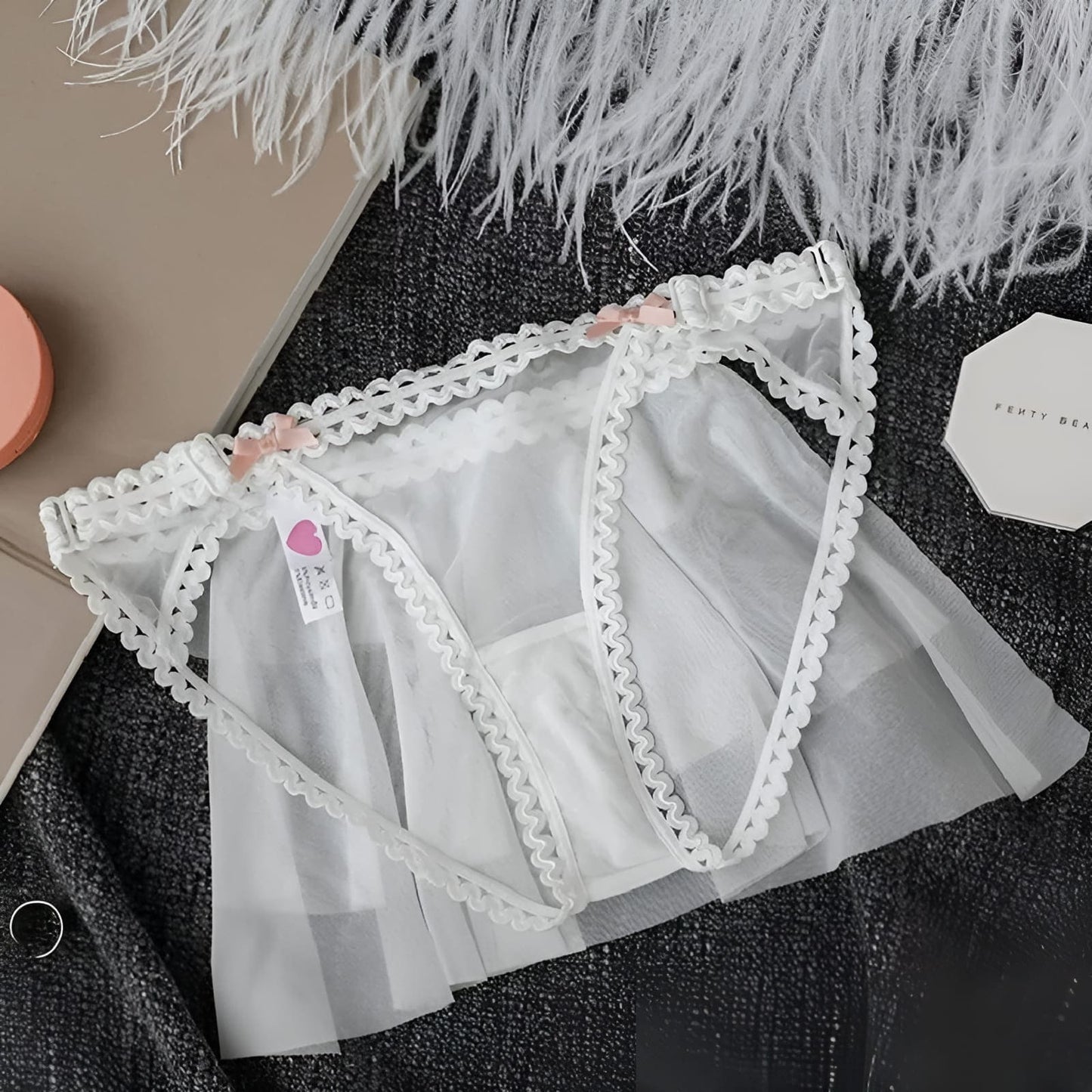 Soft white mesh thong with ruffle detail, breathable and flirty lingerie front view