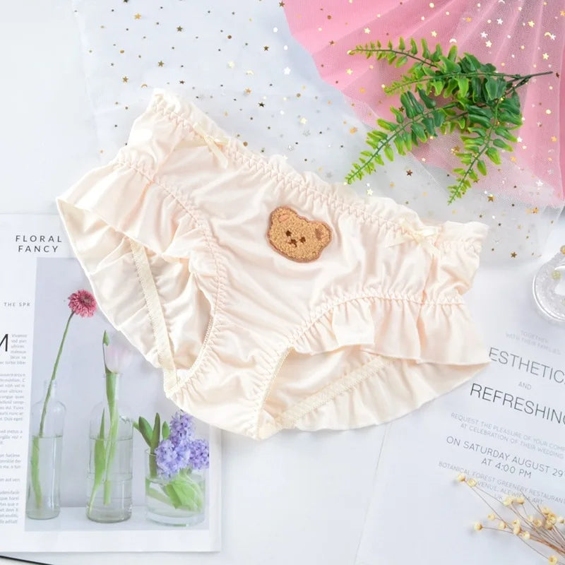Yellow teddy ruffle panties with charming teddy bear print and stretchy waistband for all-day comfort