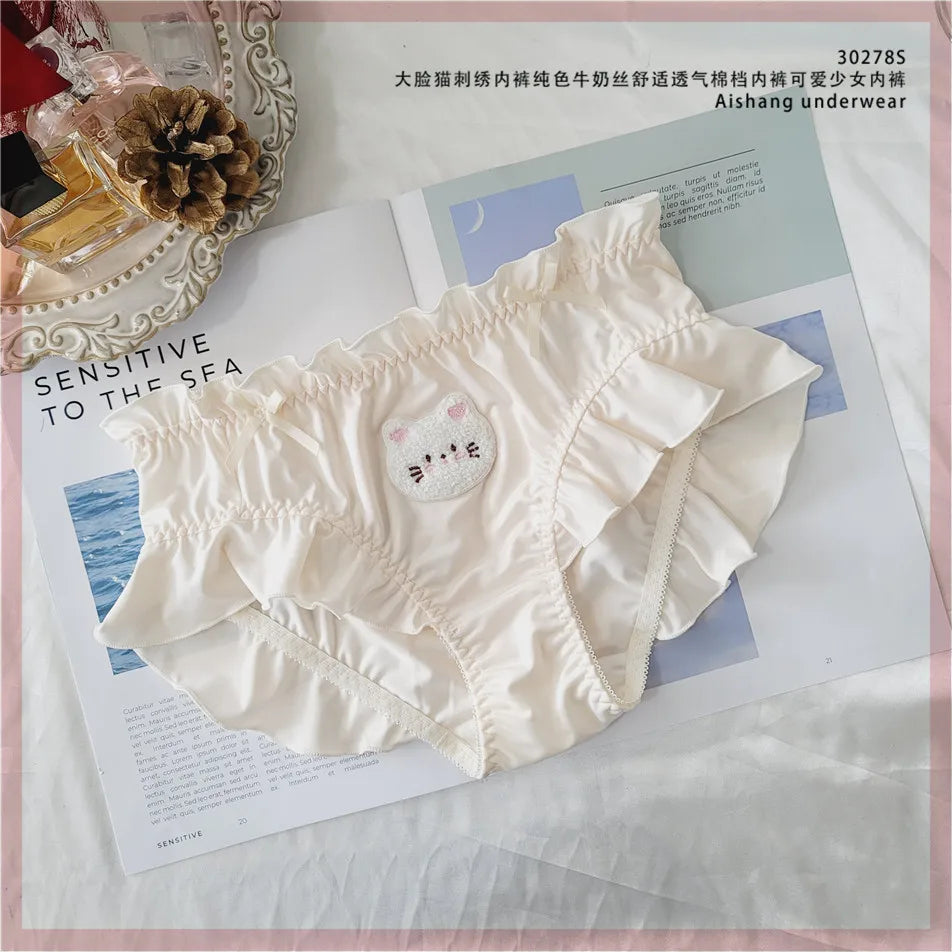 Yellow soft and comfy teddy ruffle panties with cute print ideal for lounging and photoshoots