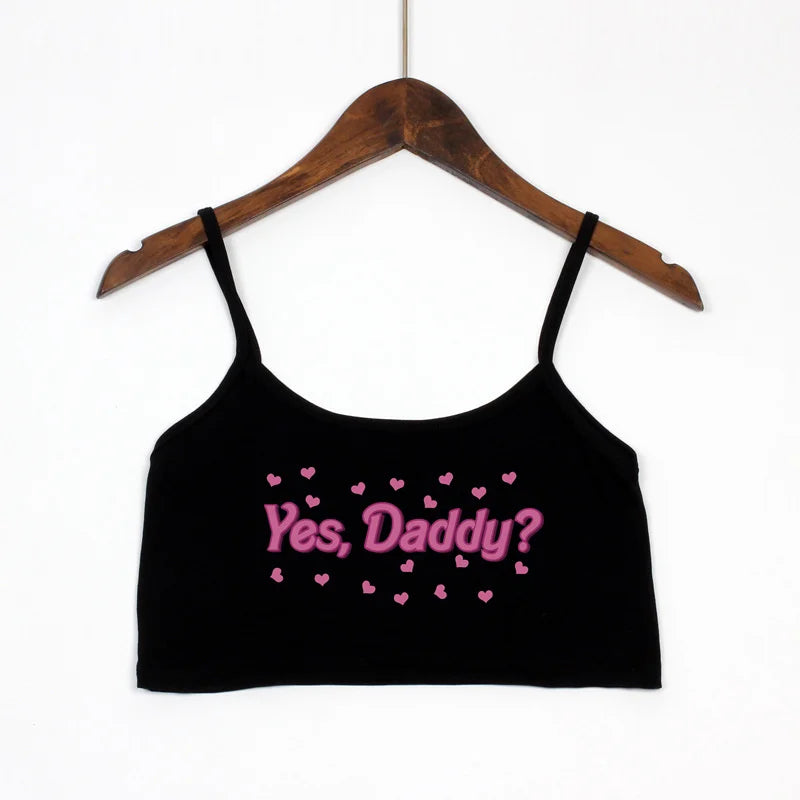 Black Yes Daddy cami crop top front view, soft and comfy fabric with cropped fit, ideal for pairing with high-waisted bottoms