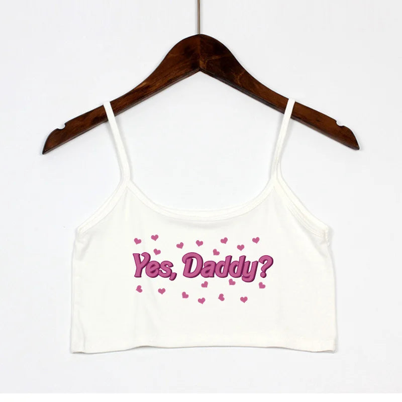 White Yes Daddy cami crop top side view, stretchy soft fabric with cute tiny hearts, perfect for lounging or nights out