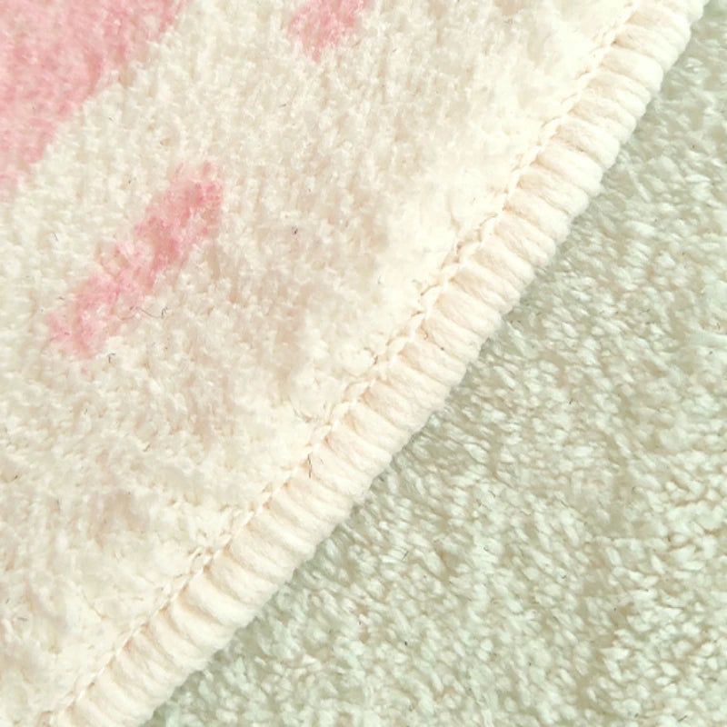 close-up of pastel kawaii rug fabric showing soft material and detailed stitching
