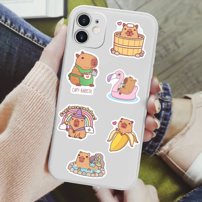 50-pack of cartoon-style capybara stickers in pastel kawaii design, made for creative decorating fun.