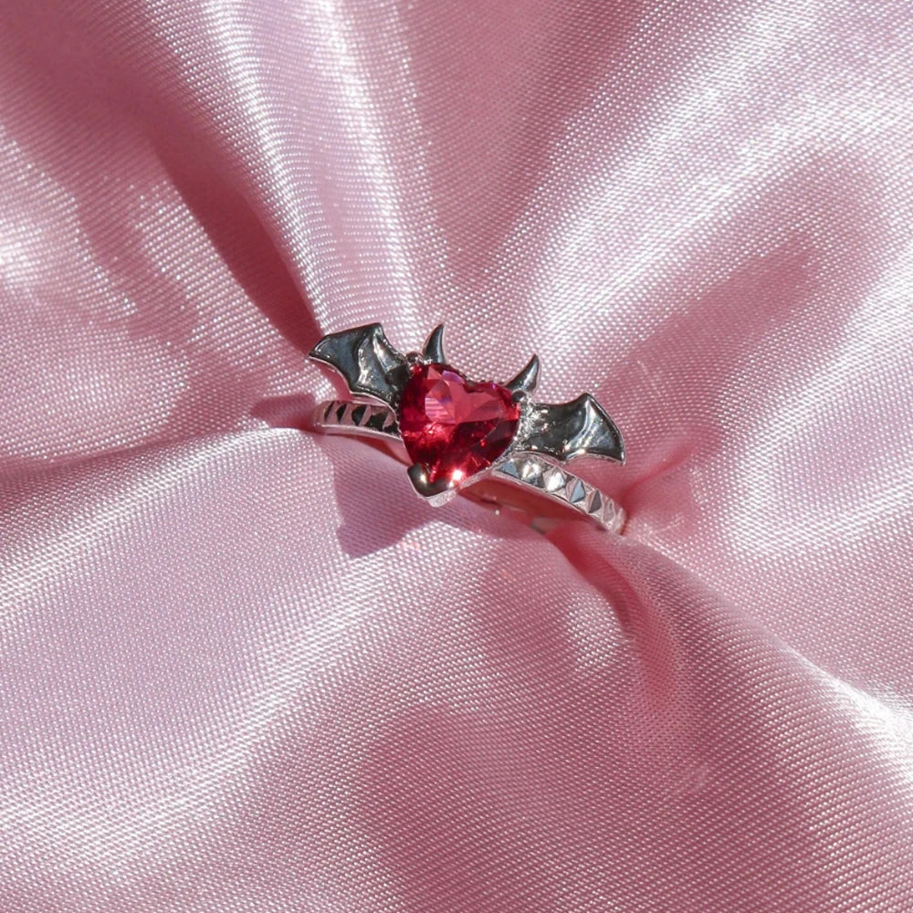 adjustable forbidden love heart ring with sleek design and edgy dark vibes