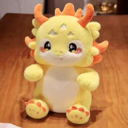 Adorable yellow-orange plush dragon, ideal for gifting dragon or zodiac fans.