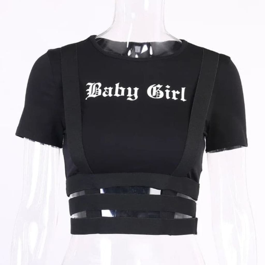 Soft and stretchy Baby Girl crop top styled with low-rise jeans for a trendy alt-girl streetwear look