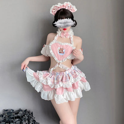 Model posing in angel teddy bear maid ruffle set, DDLGirl coquette style