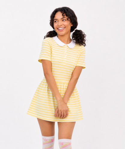 Close up of yellow and white stripe detailing on Baby Bee onesie dress