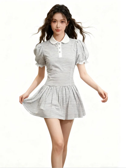 Full length view of Navy Blue striped Baby Bee onesie dress showing bee inspired design