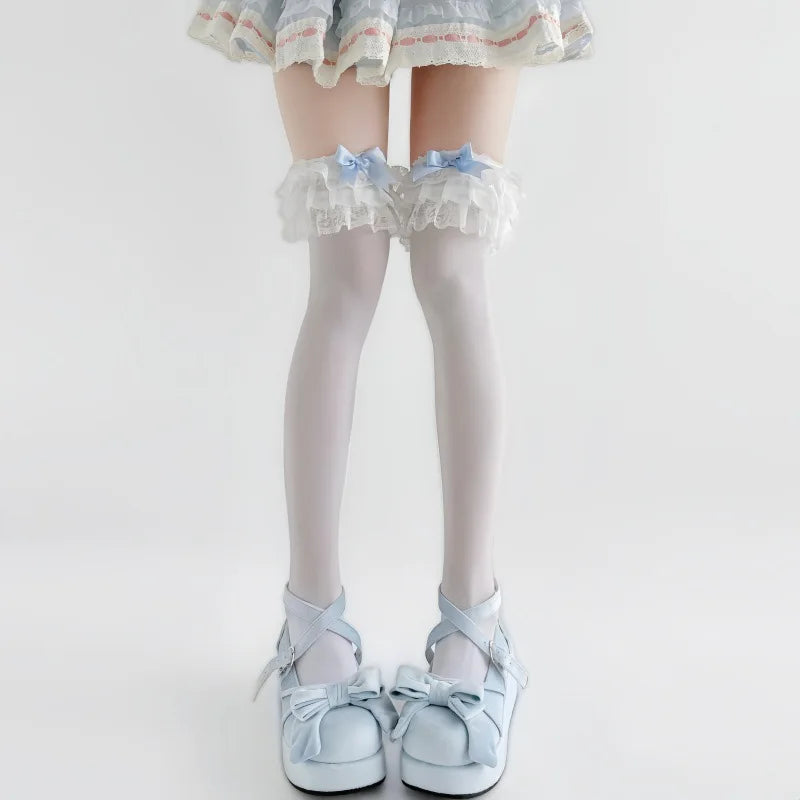 Layered lace ruffle cuff detail on baby blue doll bow stockings