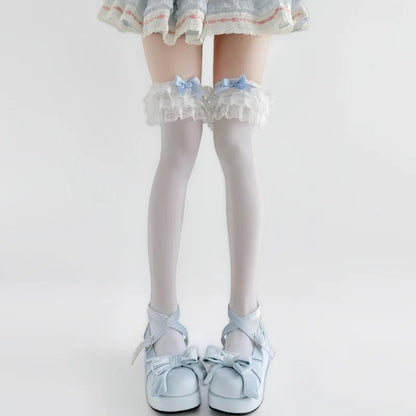 Layered lace ruffle cuff detail on baby blue doll bow stockings