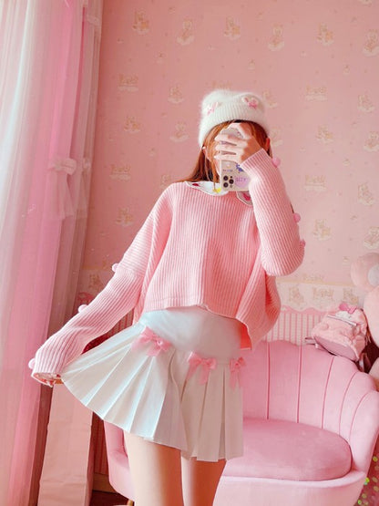 Model wearing Baby Doll Pink Bow pleated skort showing pleat movement