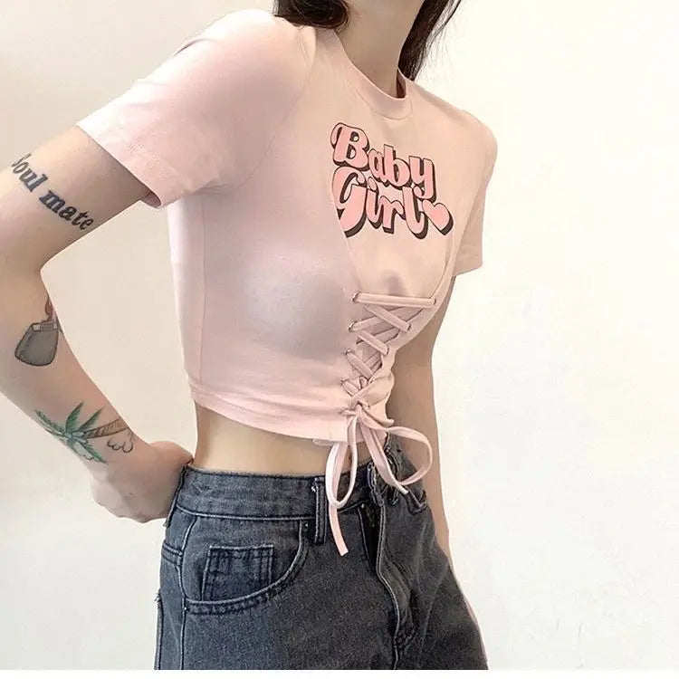 Classic crew neckline detail on Baby Girl brat lace up crop top