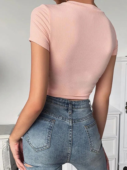 Back of pink babygirl crop top with soft aesthetic design