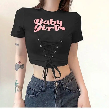 Babygirl Glow black lace-up crop top, perfect for baddiecore and little space outfits