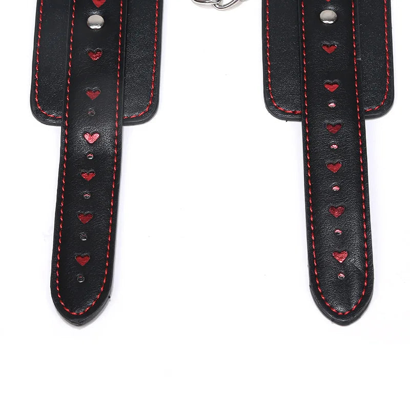 Black feet cuffs linked with red heart chain for DDLG roleplay, playful cutebaddie style, and flirty fantasy outfits