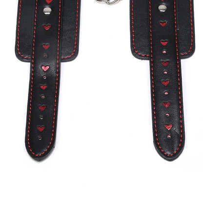 Black feet cuffs linked with red heart chain for DDLG roleplay, playful cutebaddie style, and flirty fantasy outfits