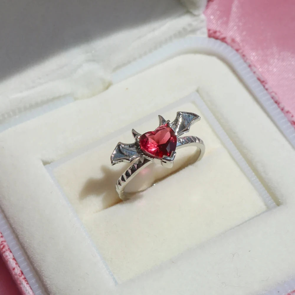 black heart ring with delicate wings and horns unique dark romantic accessory