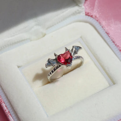 black heart ring with delicate wings and horns unique dark romantic accessory