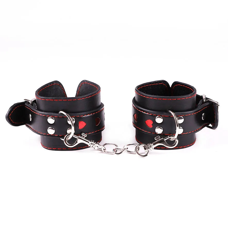 Black feet cuffs with red mini hearts for DDLG play, playful cutebaddie style, and flirty fantasy outfits