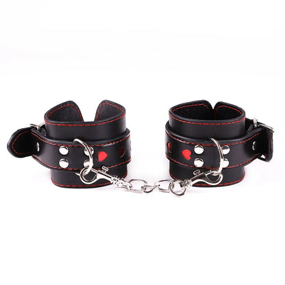 Black feet cuffs with red mini hearts for DDLG play, playful cutebaddie style, and flirty fantasy outfits