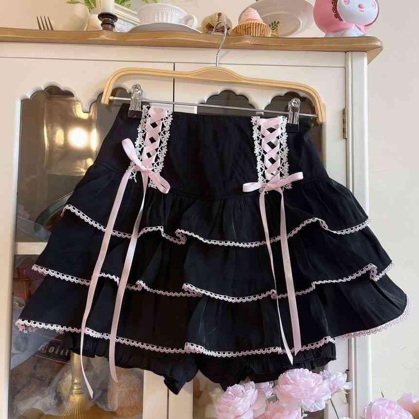 Black and white Lolita ribbon corset skirt with frilly layers and high-waist corset for kawaii, soft goth, DDLG, ABDL, and cutecore fashion
