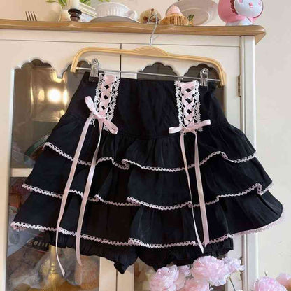 Black and white Lolita ribbon corset skirt with frilly layers and high-waist corset for kawaii, soft goth, DDLG, ABDL, and cutecore fashion