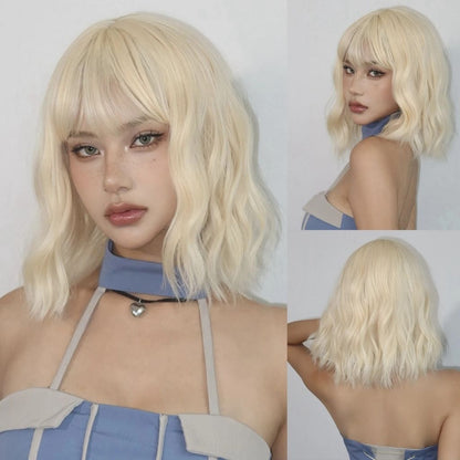 Blonde version of the Little Romantic Wavy Bob Wig with soft curls and full bangs