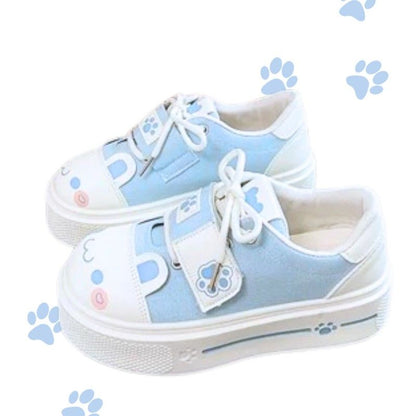 Cute pastel blue kawaii sneakers with blushing kitten face and playful paw accents for softcore vibes