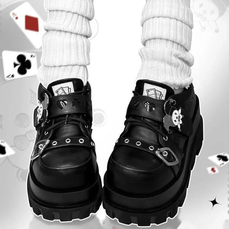 Bold kawaii platforms with joker card design and chunky soles for daring alternative fashion