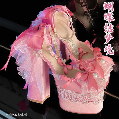 Pastel pink Lolita Bombshell heels with elegant ribbon and pearl accents, kawaii fashion vibe