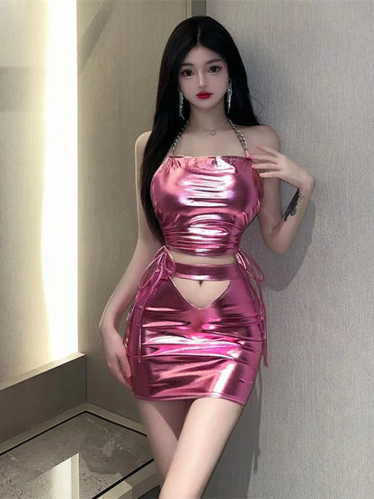 Close-up of metallic pink mini skirt, figure-hugging & playful, kawaii & sexy vibes