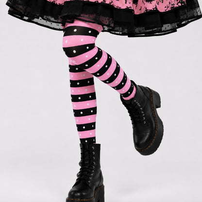 Full outfit editorial shot featuring bubblegum brat stockings styled with a lolita dress