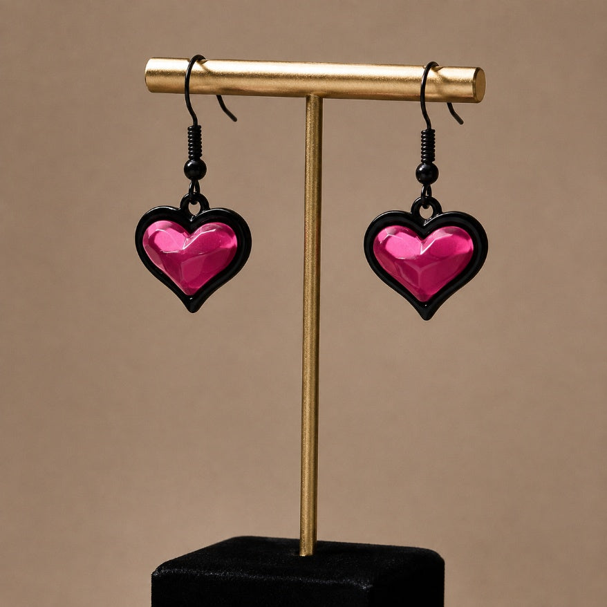 Lightweight dangle detail on bubblegum goth sweetheart heart earrings