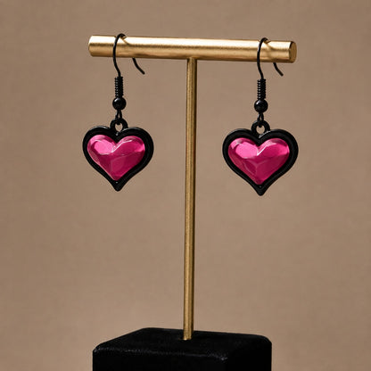 Lightweight dangle detail on bubblegum goth sweetheart heart earrings