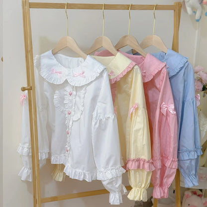Bunny Lolita ears blouse collection in pastel yellow, white, blue, and pink, kawaii playful hood and Peter Pan collar styles