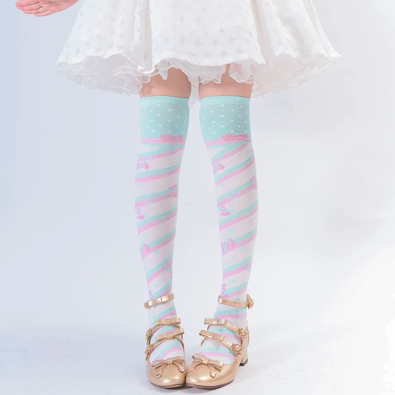 Candy stripe lace stockings with pastel colors, playful bonbon ribbons, and heart details for softcore kawaii style