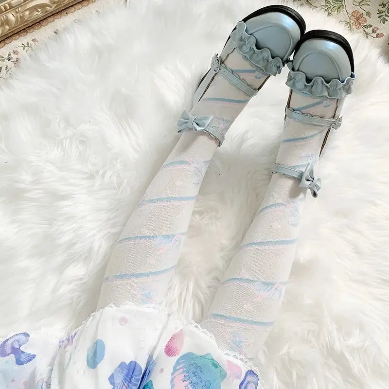 Candy stripe sugar lace stockings in pastel blue with bonbon ribbons and heart accents for kawaii vibes