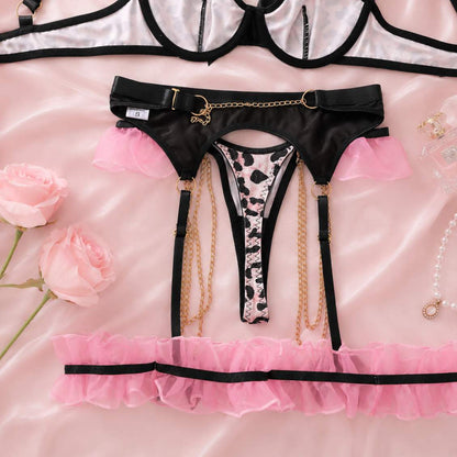 Back view of coquette leopard print lingerie set with black straps and pink ruffles