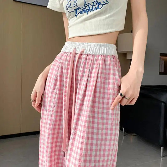 Cozy pink plaid pants with loose wide-leg fit for soft kawaii ddlg fashion