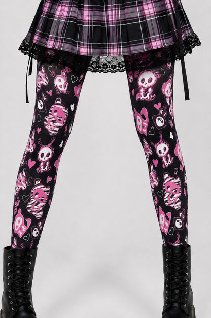 Close up of skeleton bunny print and scattered hearts on black kawaii goth tights
