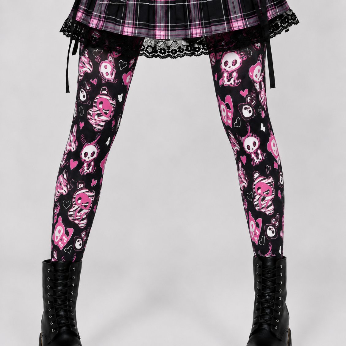 Creepy kawaii skeleton bunny tights with hot pink hearts on black sheer hosiery, front view
