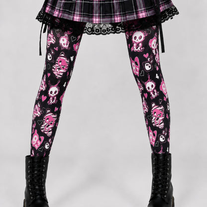 Creepy kawaii skeleton bunny tights with hot pink hearts on black sheer hosiery, front view