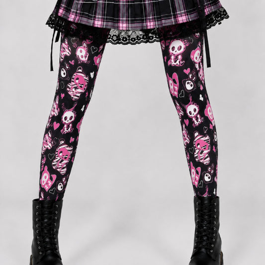 Creepy kawaii skeleton bunny tights with hot pink hearts on black sheer hosiery, front view