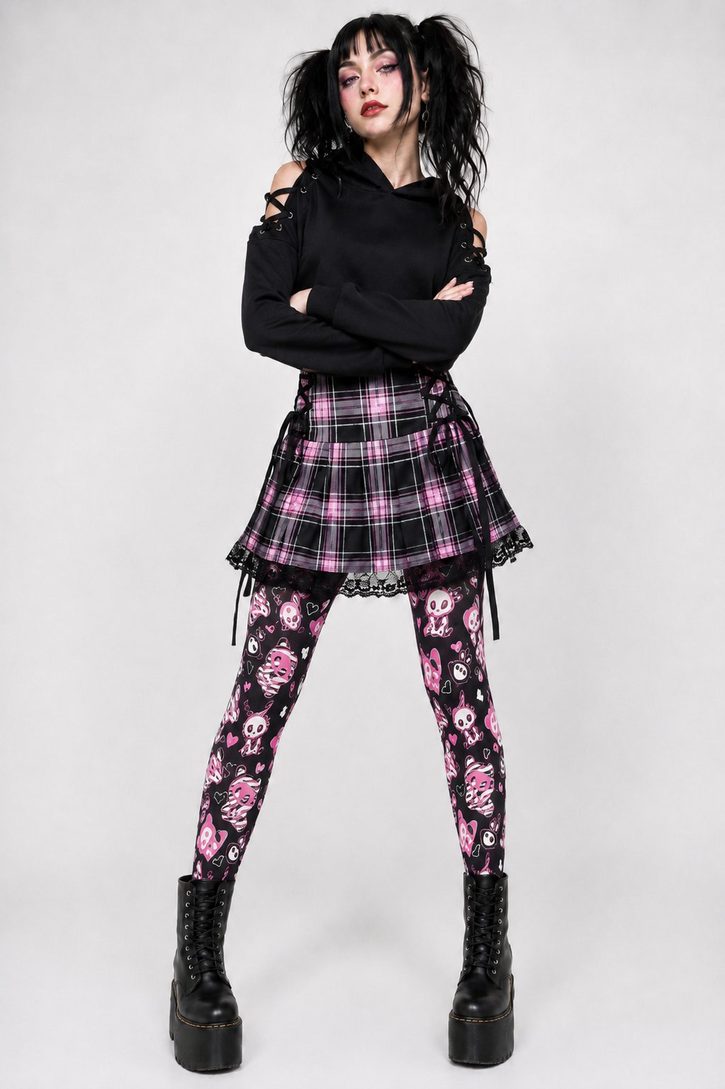 Model pairing skeleton bunny print tights with platform boots for goth kawaii streetwear