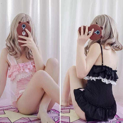 pink bunny and black kitty play onesie with frills, bows, and ears for little-space DDLG/ABDL cutecore, pastel, kawaii, and Lolita vibes